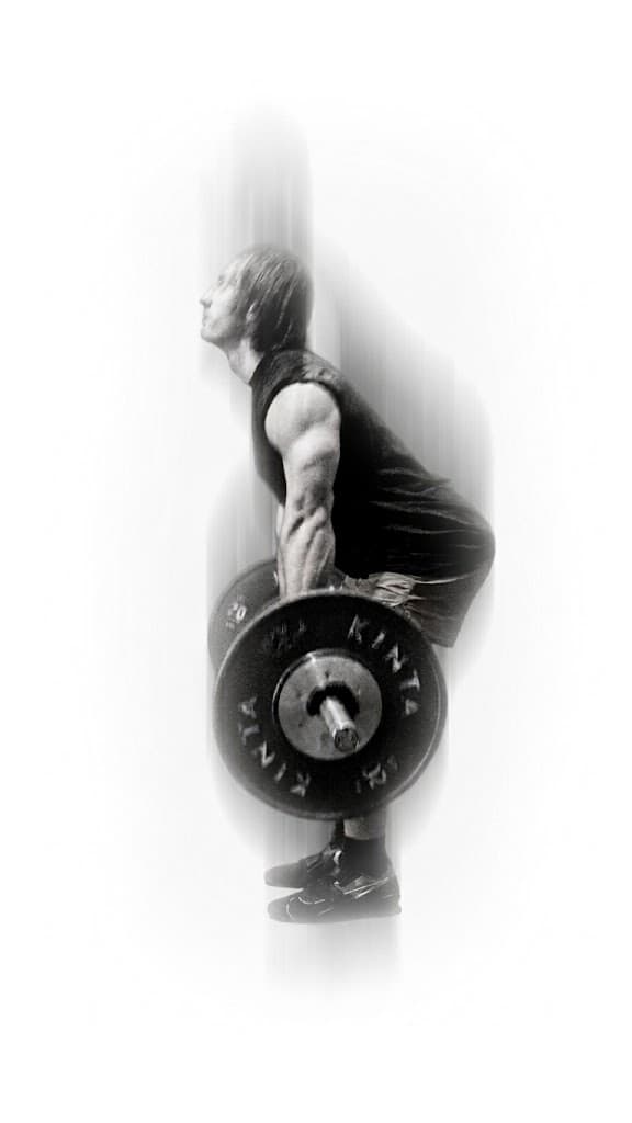 Athlete lifting a loaded barbell in the power position